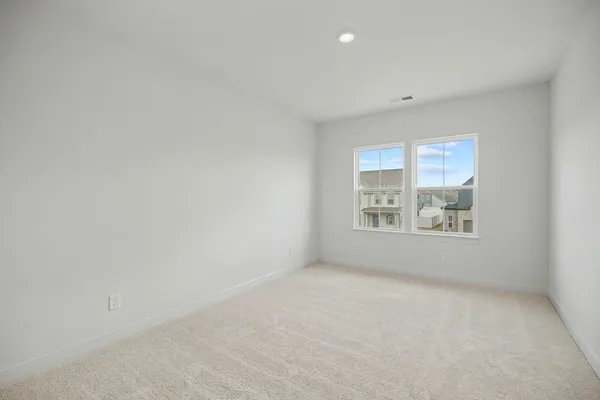 a view of an empty room and closet