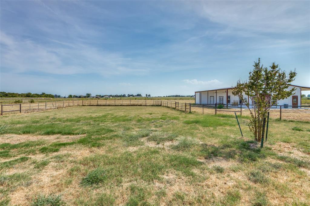 11744 Foutch Road Pilot Point, TX 76258 - Photo 29 of 35 a view of an outdoor space and deck of the house