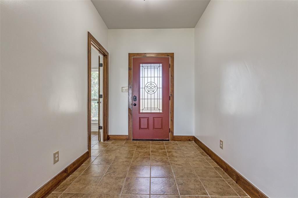 11744 Foutch Road Pilot Point, TX 76258 - Photo 5 of 35 a view of an front door