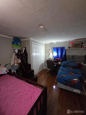 a room with furniture and a flat screen tv