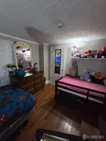 a room with furniture and a flat screen tv