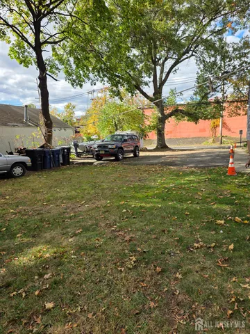 a view of a garden with trees