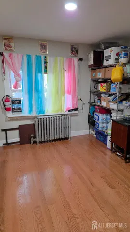 a room with furniture and a flat screen tv