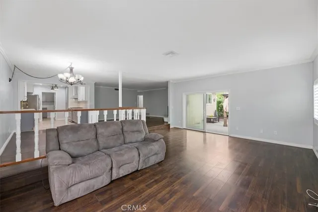 a sink with white cabinets