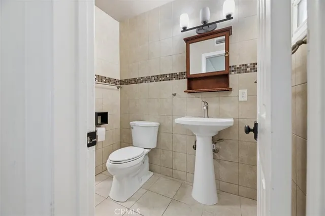 a bedroom with a bed furniture and a window