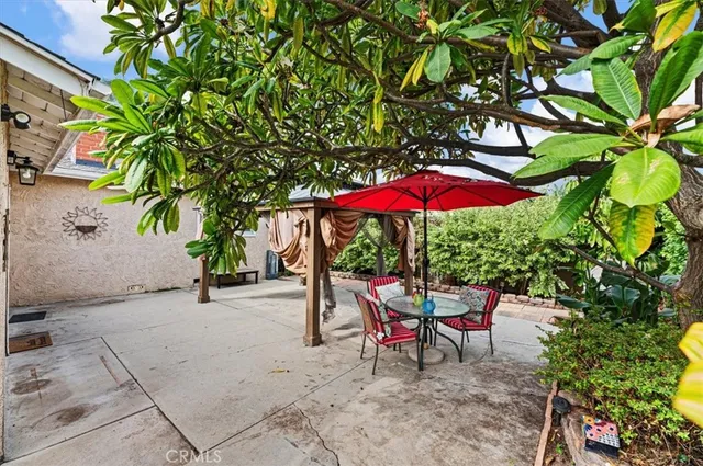 an aerial view of a house with a swimming pool