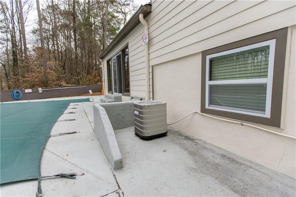 4735 North Springs Road Northwest Kennesaw, GA 30144 - Photo 33 of 34 a view of roof with sitting area