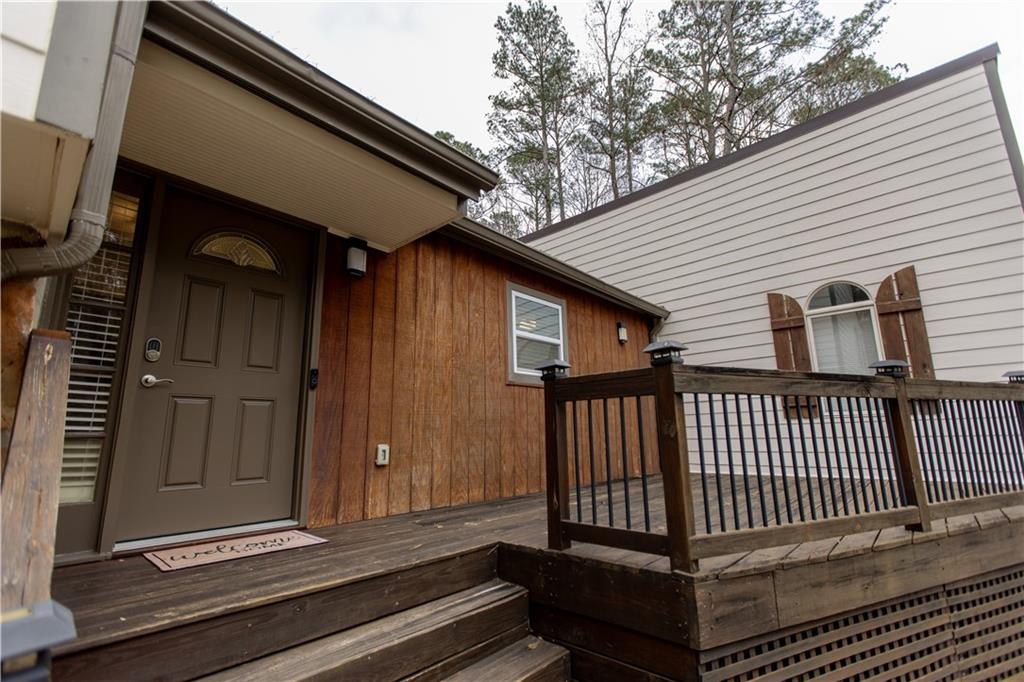 4735 North Springs Road Northwest Kennesaw, GA 30144 - Photo 4 of 34 a porch with seating space