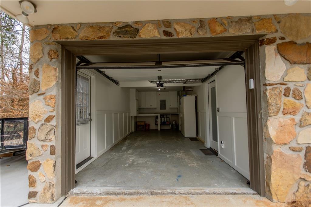 4735 North Springs Road Northwest Kennesaw, GA 30144 - Photo 6 of 34 a view of a car garage