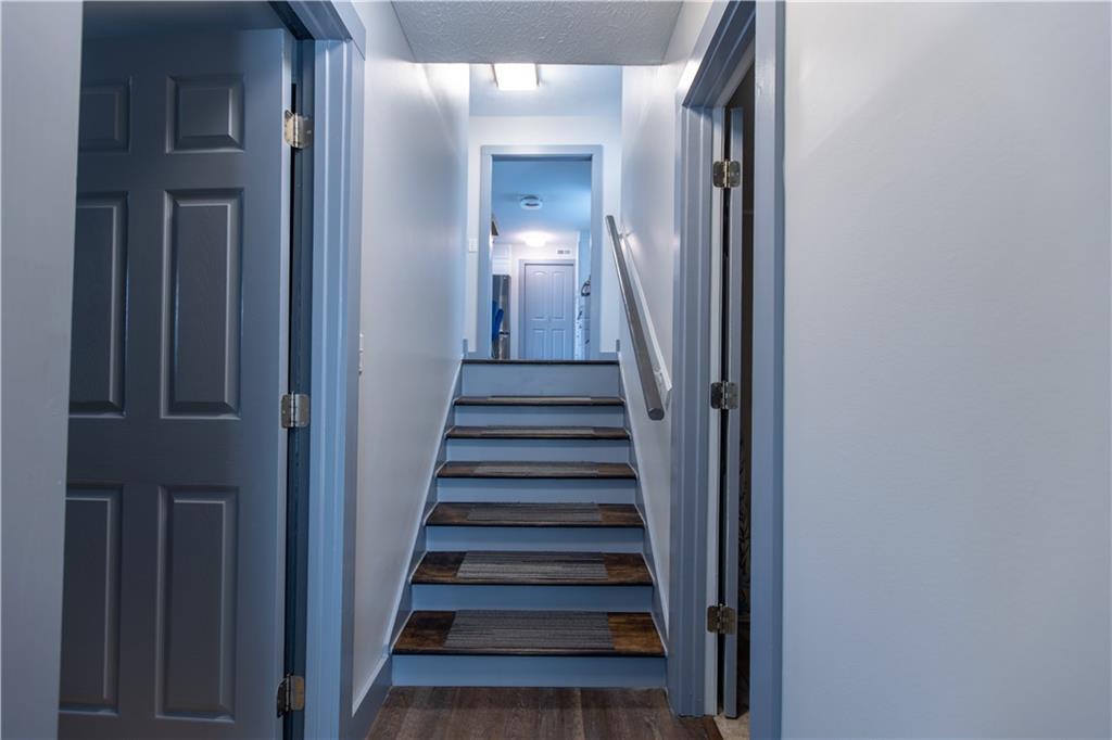 4735 North Springs Road Northwest Kennesaw, GA 30144 - Photo 10 of 34 a view of a hallway with a hallway