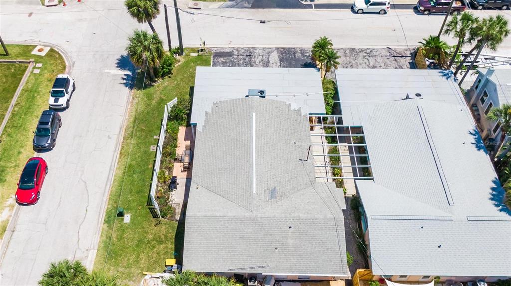 52 154th Avenue, Unit 52 Madeira Beach, FL 33708 - Photo 2 of 2 an aerial view of a house with outdoor space