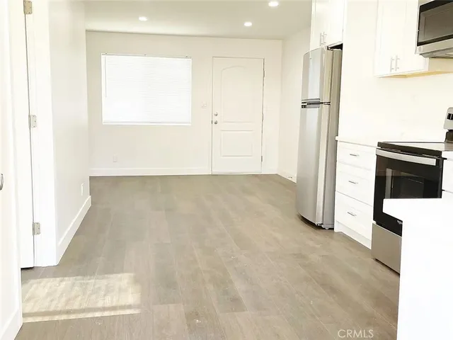 a view of kitchen and utility room