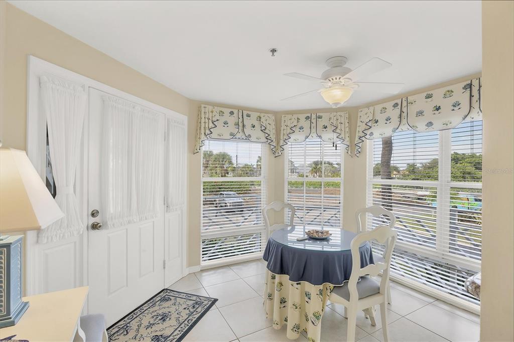 11000 Placida Road, Unit 1801 Placida, FL 33946 - Photo 3 of 53 a living room with furniture and a window