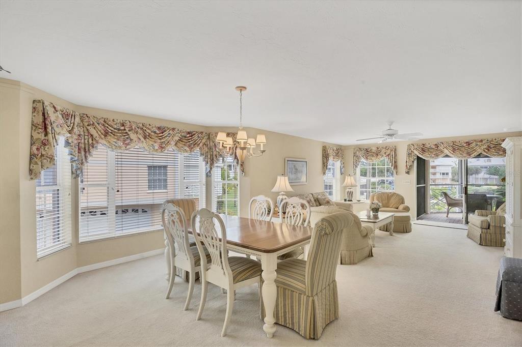 11000 Placida Road, Unit 1801 Placida, FL 33946 - Photo 5 of 53 a view of a livingroom with furniture and a large window