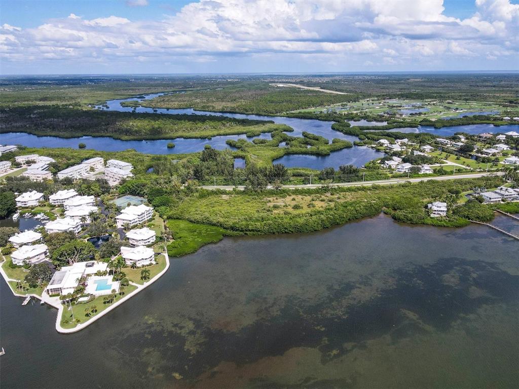 11000 Placida Road, Unit 1801 Placida, FL 33946 - Photo 51 of 53 a view of a lake with a mountain