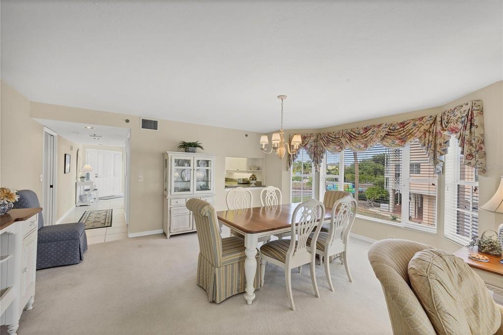 11000 Placida Road, Unit 1801 Placida, FL 33946 - Photo 10 of 53 a view of a dining room with furniture window and outside view