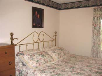 662 Tuggle Road Lancaster, KY 40444 - Photo 11 of 21 This guest bedroom measures 12 x 12.