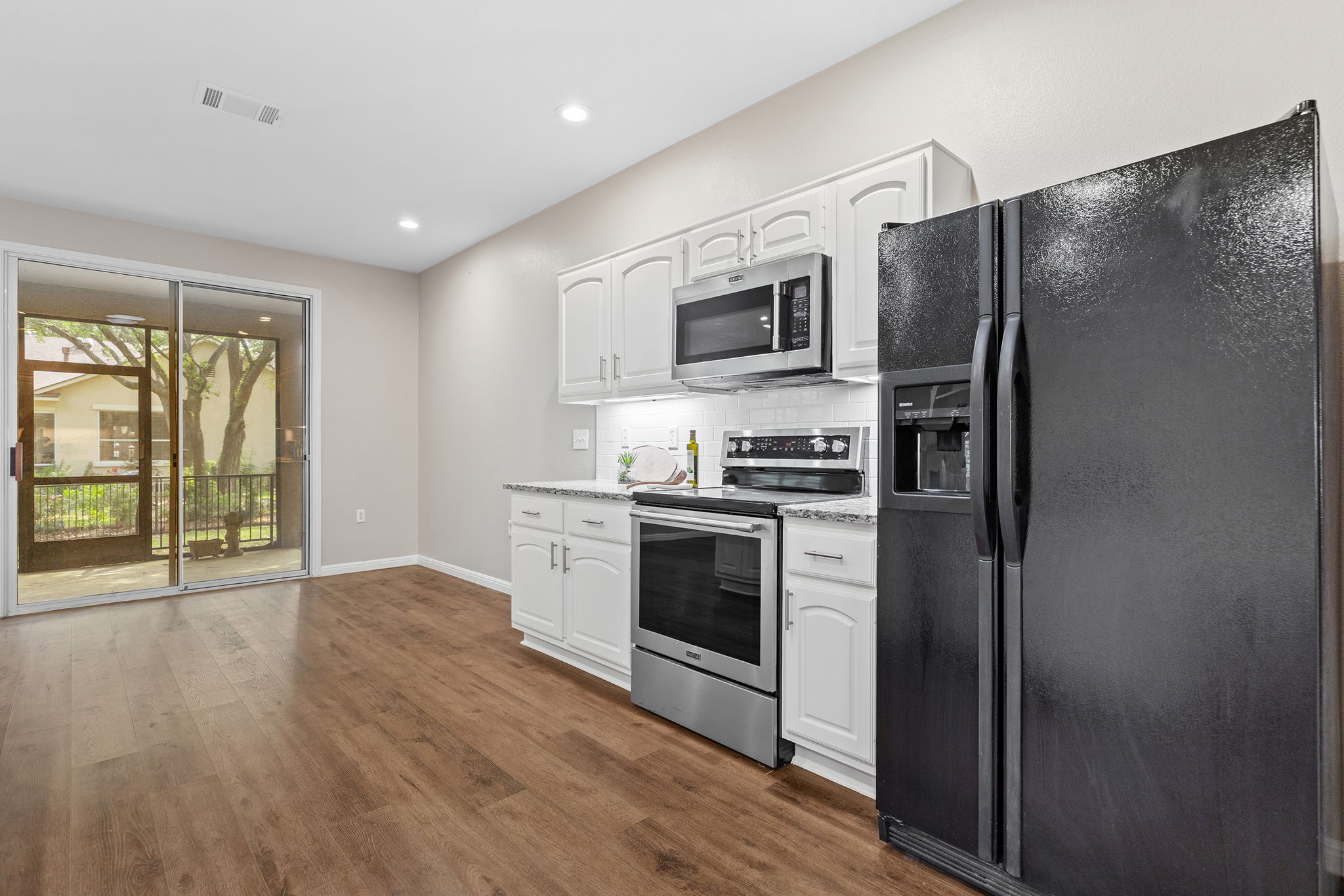 120 Ruellia Drive Georgetown, TX 78633 - Photo 19 of 39 kitchen with stainless appliances.