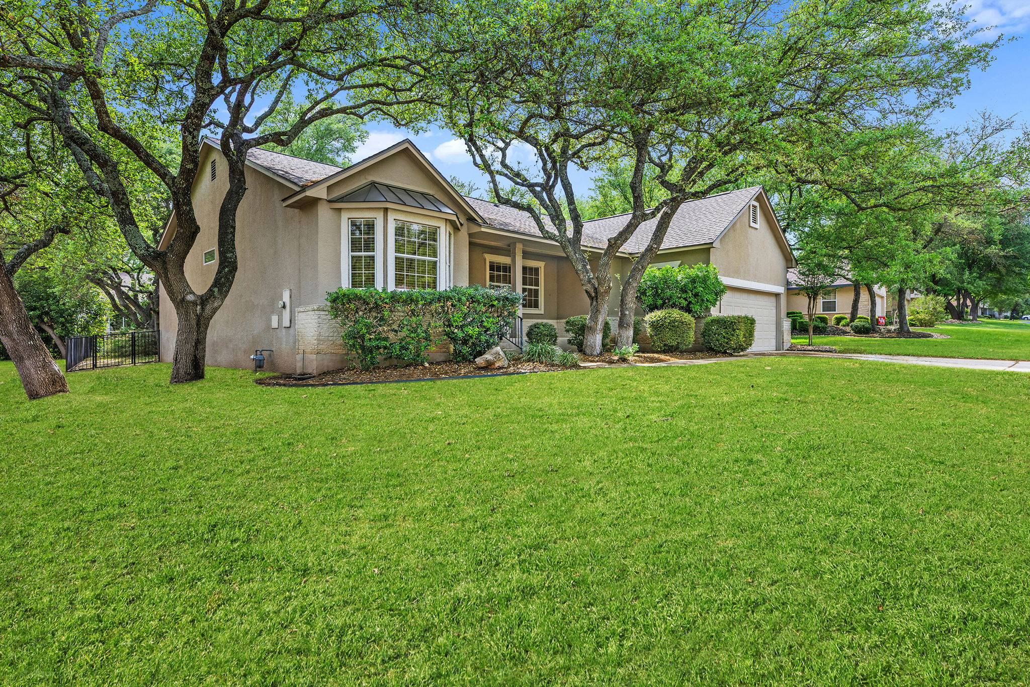 120 Ruellia Drive Georgetown, TX 78633 - Photo 36 of 39 Lush landscaping and mature trees.