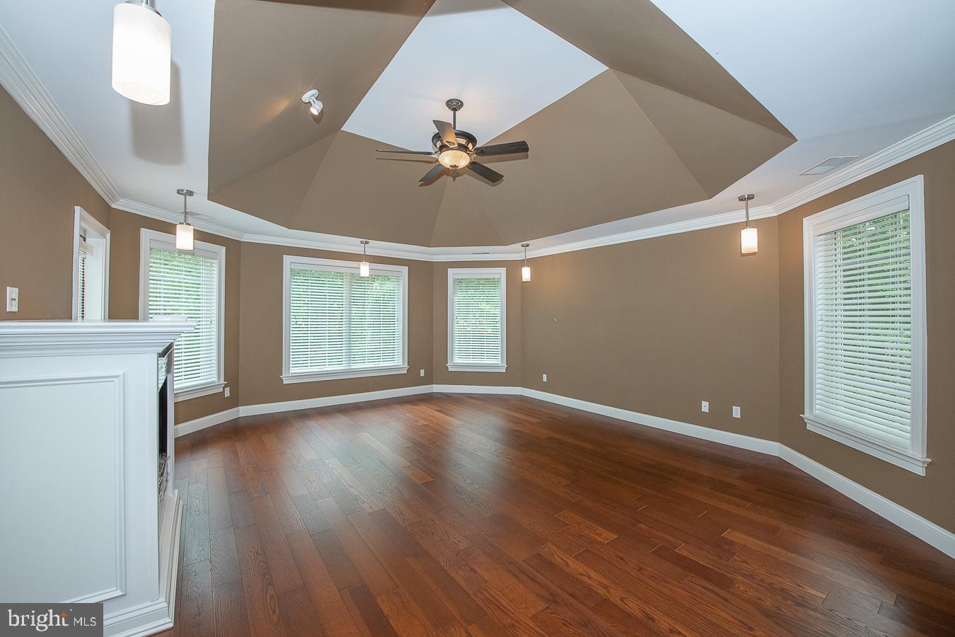 2083 Welsh Valley Road Malvern, PA 19355 - Photo 18 of 32 Trey ceiling with recessed and pendant lighting