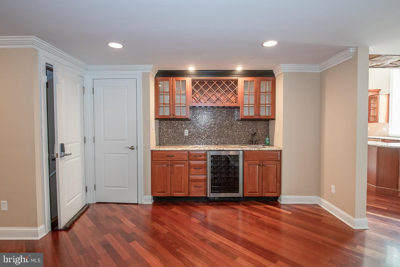 2083 Welsh Valley Road Malvern, PA 19355 - Photo 5 of 32 Wet bar has custom built-in cabinetry