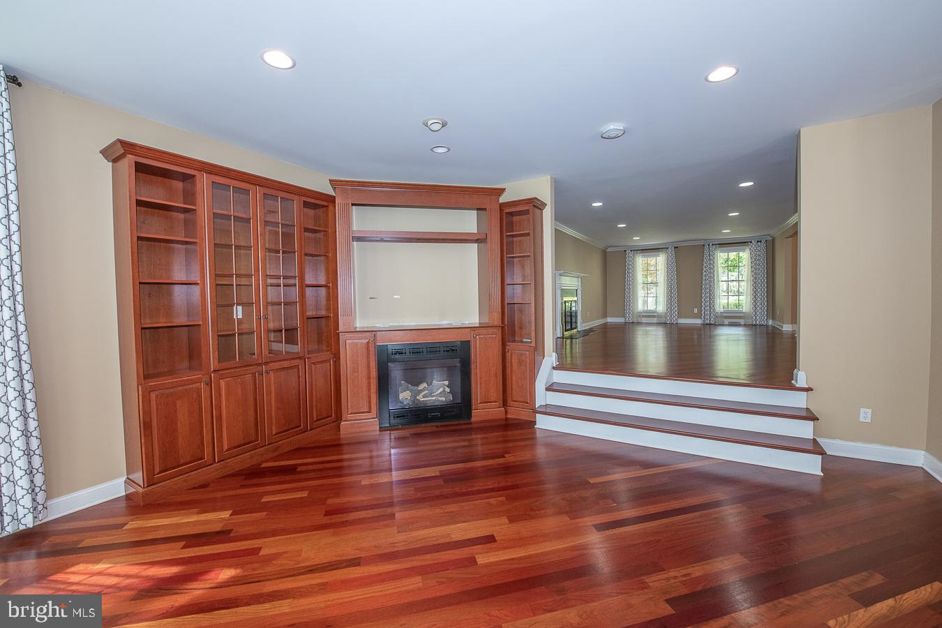 2083 Welsh Valley Road Malvern, PA 19355 - Photo 9 of 32 Family room w/ custom built-ins and gas fireplace