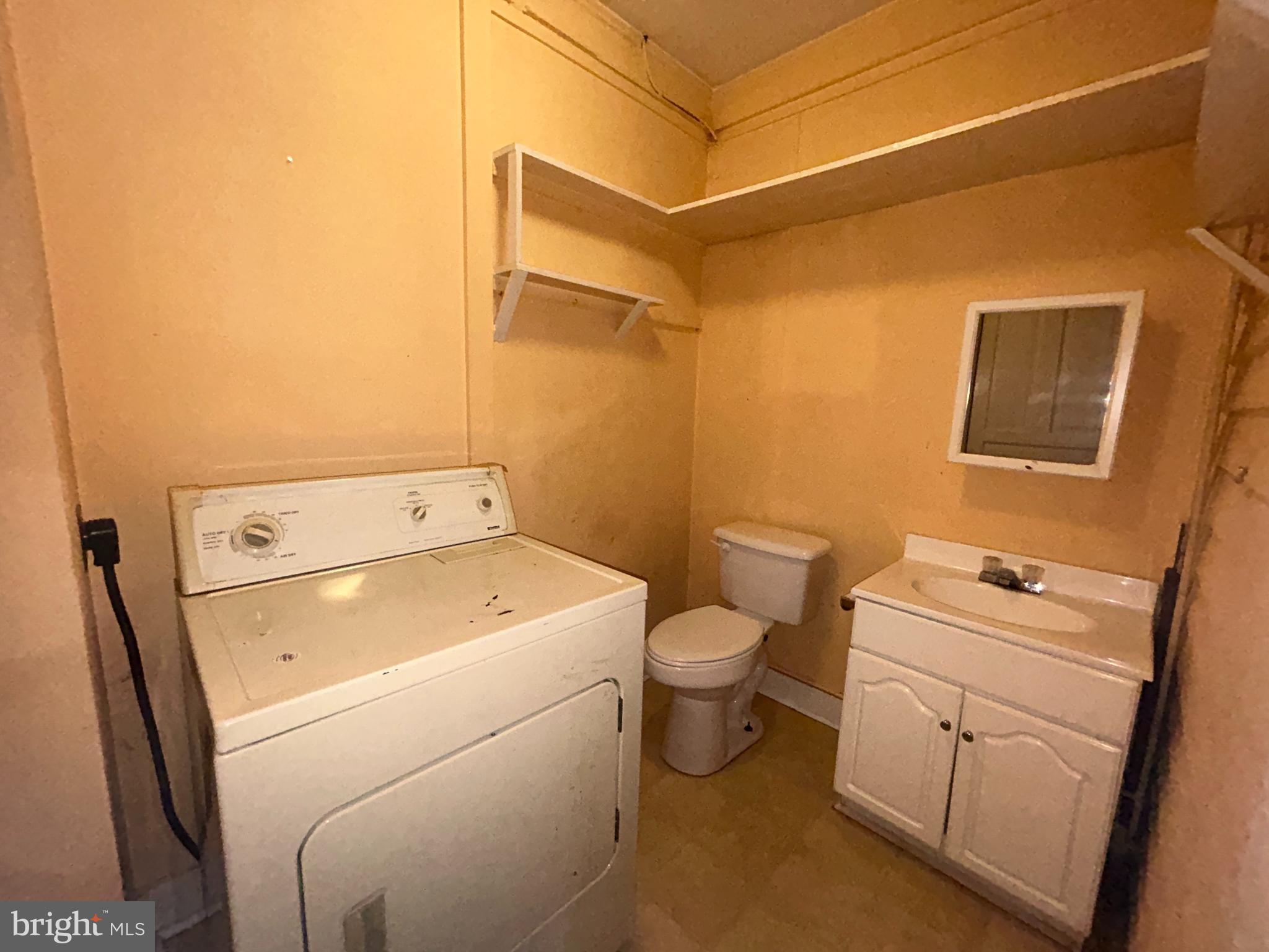 161 East Main Street Orange, VA 22960 - Photo 21 of 37 a utility room with dryer and washer