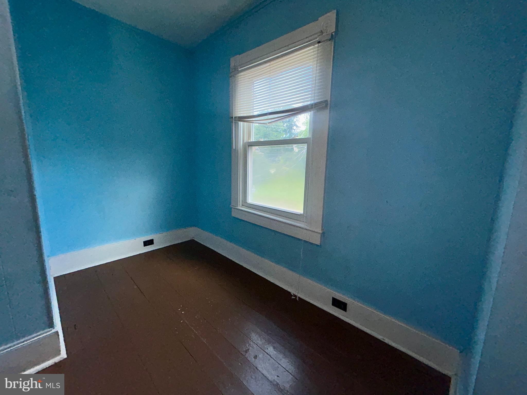 161 East Main Street Orange, VA 22960 - Photo 24 of 37 a view of an empty room with a window