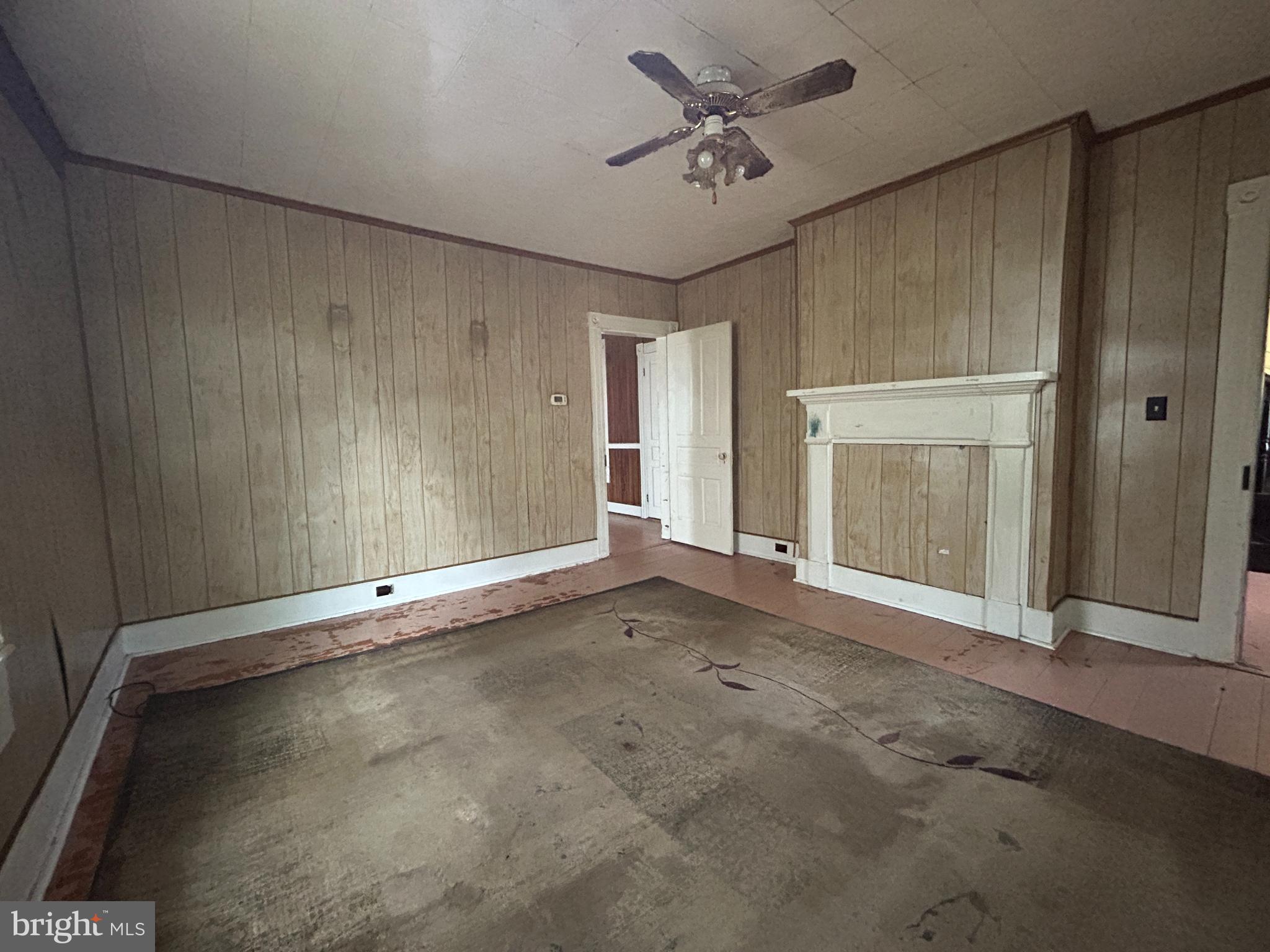 161 East Main Street Orange, VA 22960 - Photo 27 of 37 an empty room with a empty space and windows