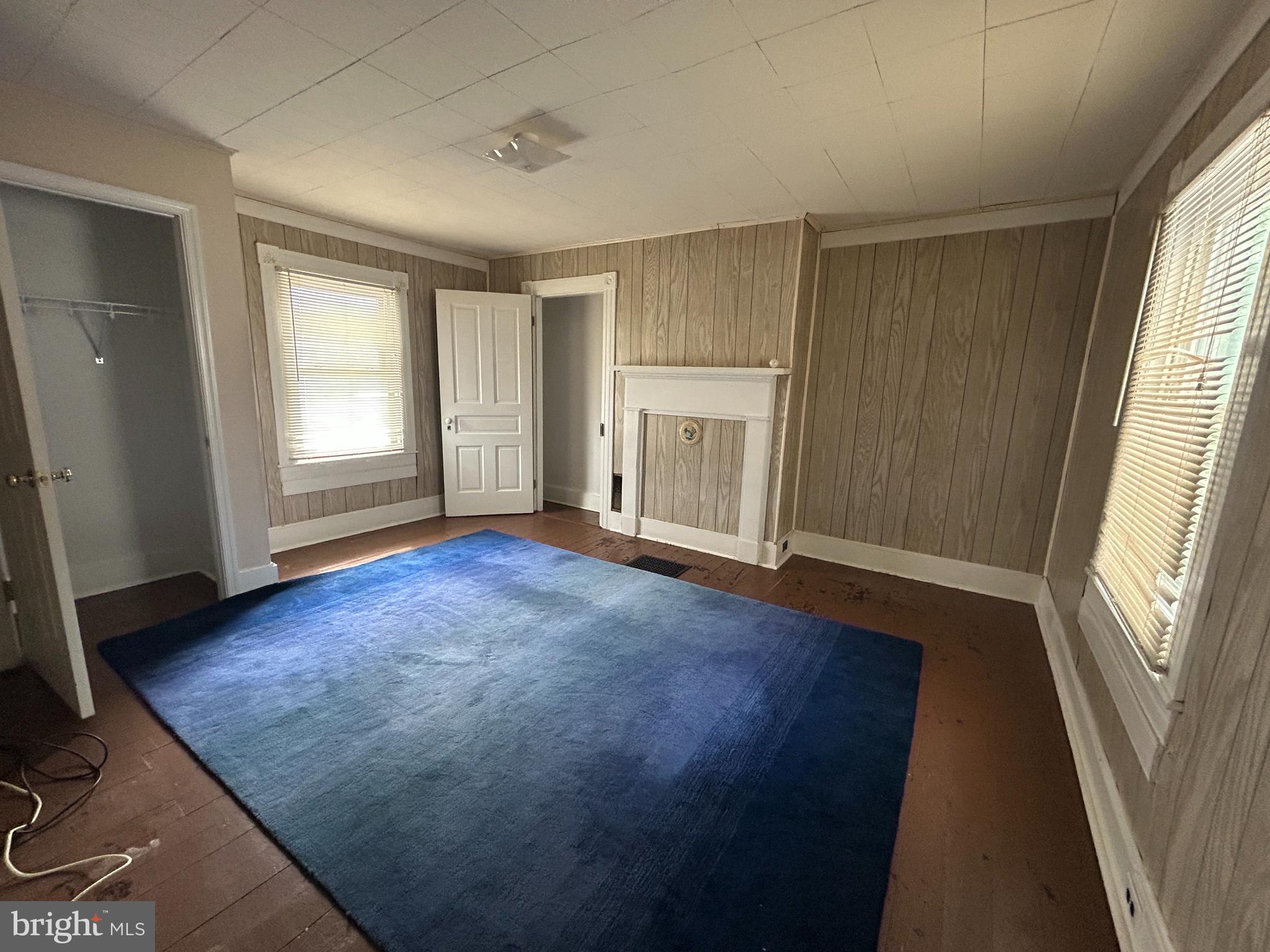 161 East Main Street Orange, VA 22960 - Photo 28 of 37 an empty room with windows