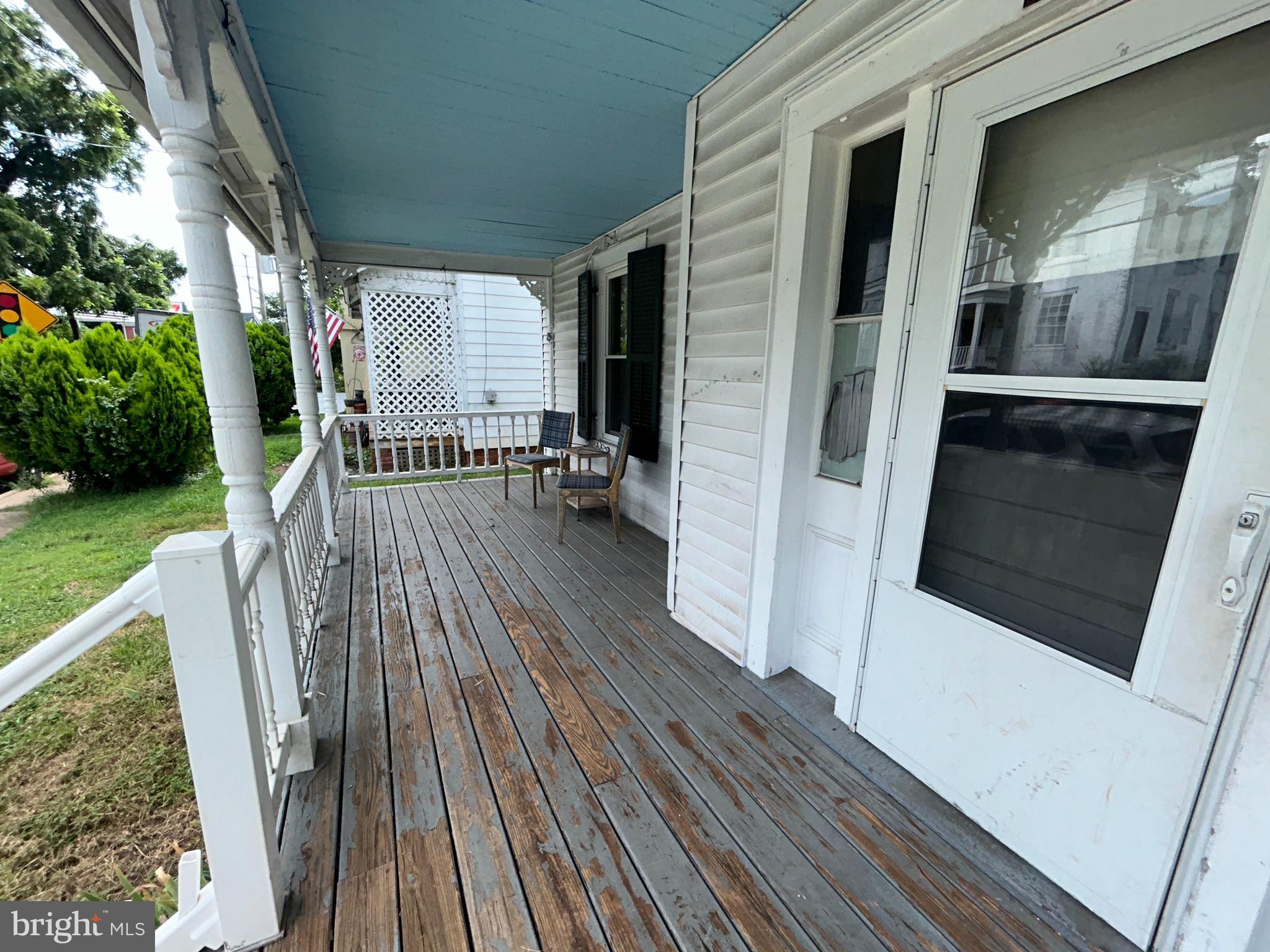 161 East Main Street Orange, VA 22960 - Photo 3 of 37 a view of outdoor space with wooden floor and windows