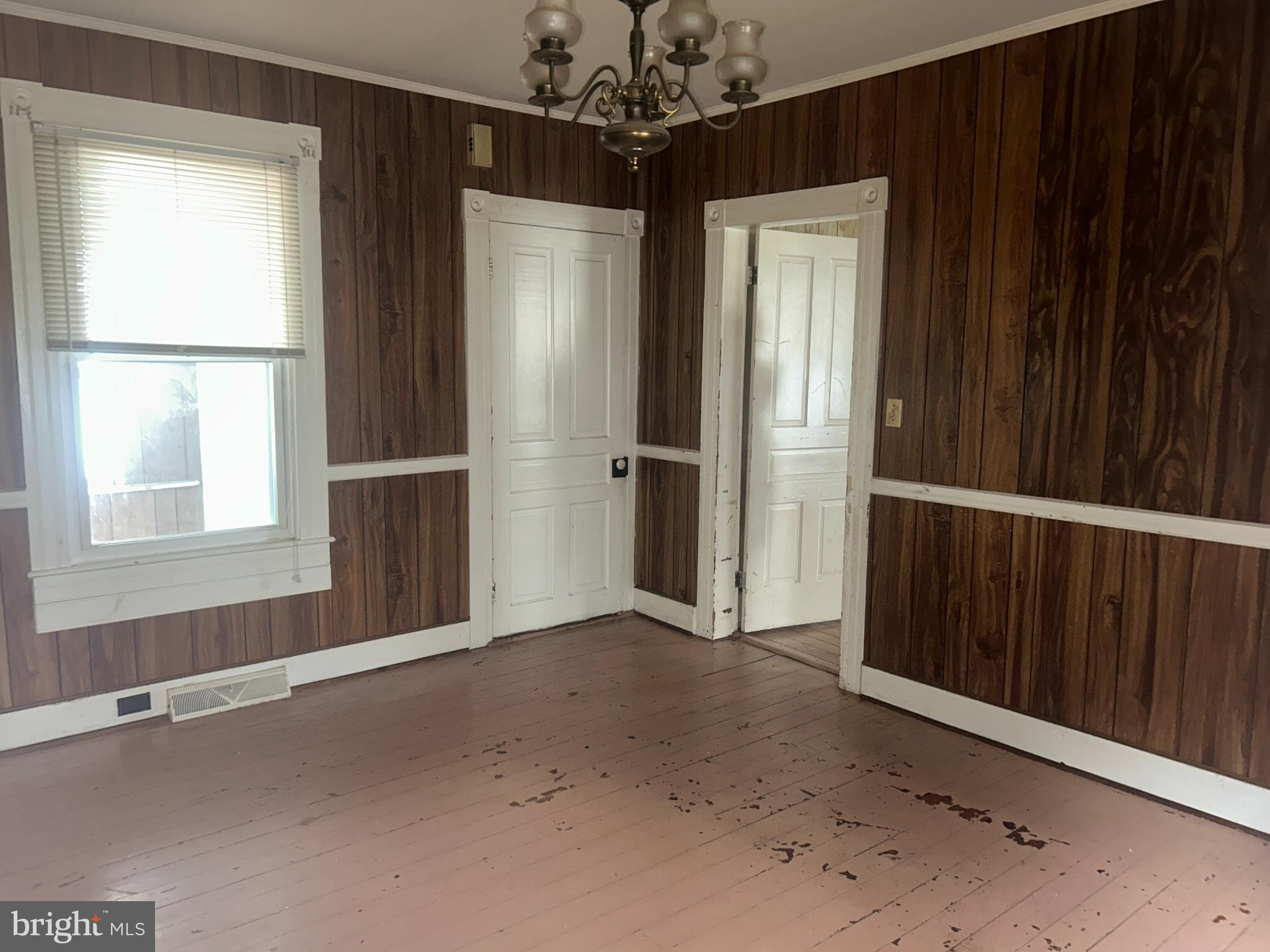 161 East Main Street Orange, VA 22960 - Photo 33 of 37 a view of an empty room with a window