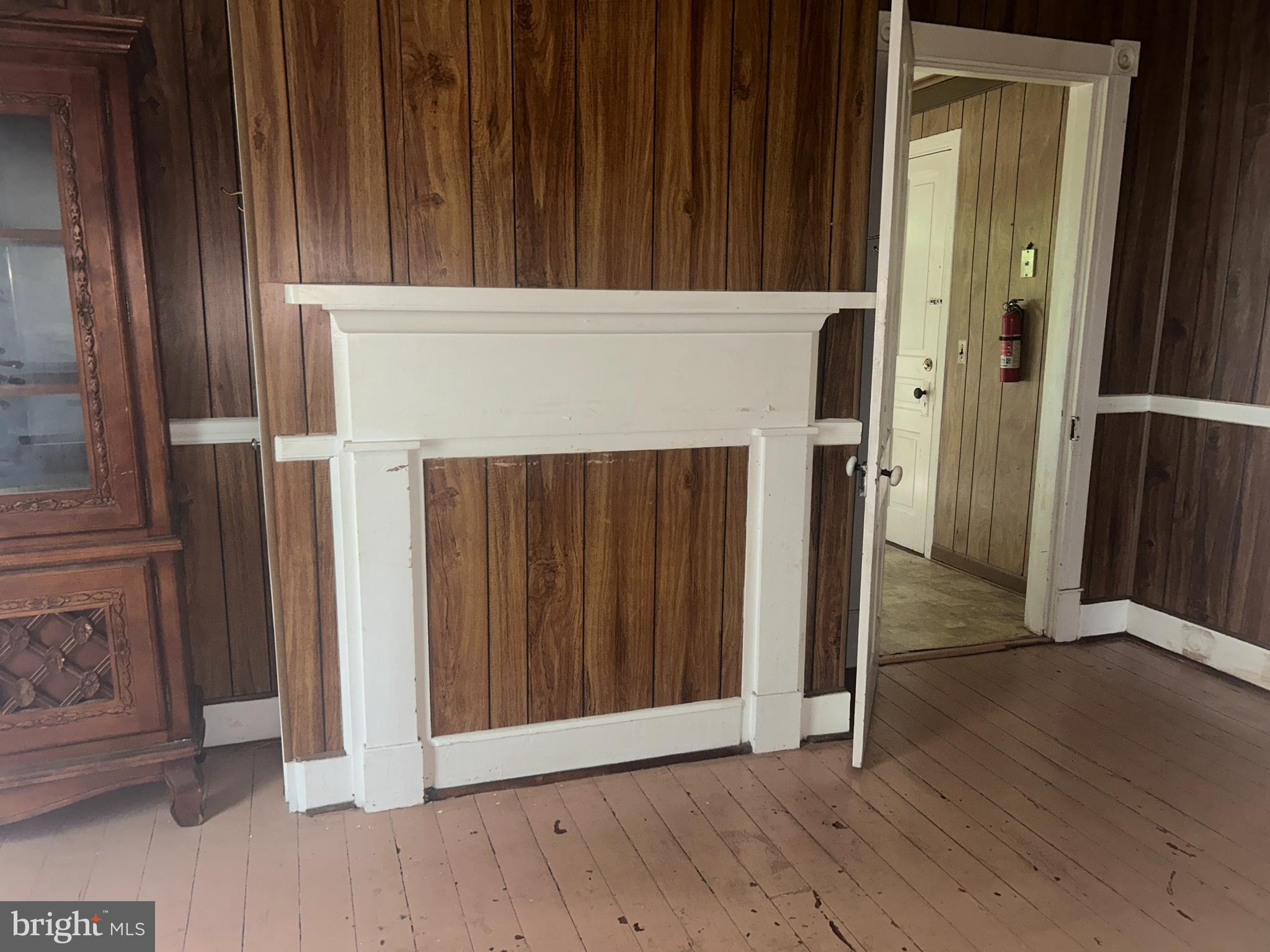 161 East Main Street Orange, VA 22960 - Photo 9 of 37 an entryway with wooden floor