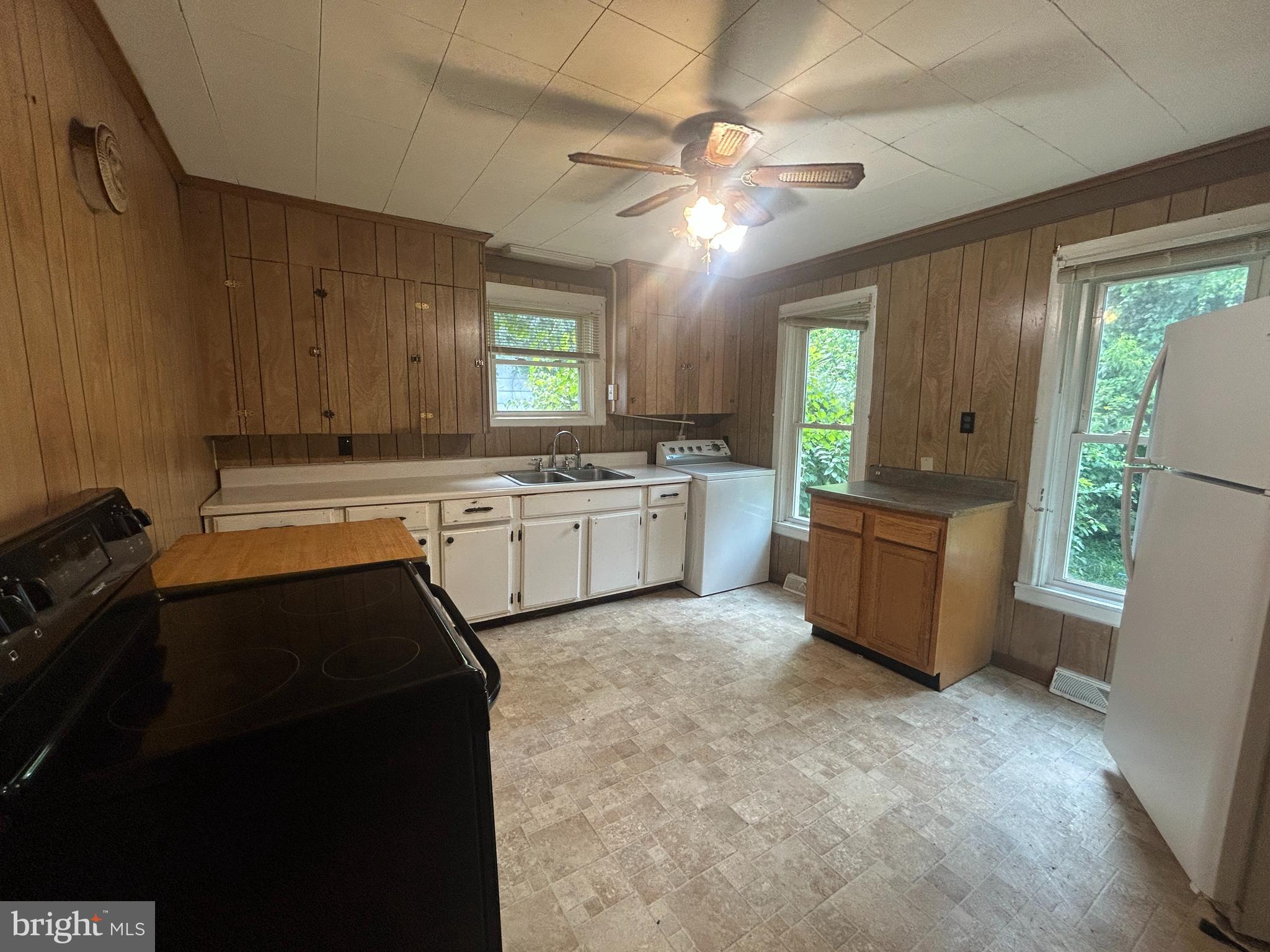 161 East Main Street Orange, VA 22960 - Photo 10 of 37 a kitchen with a sink cabinets and window