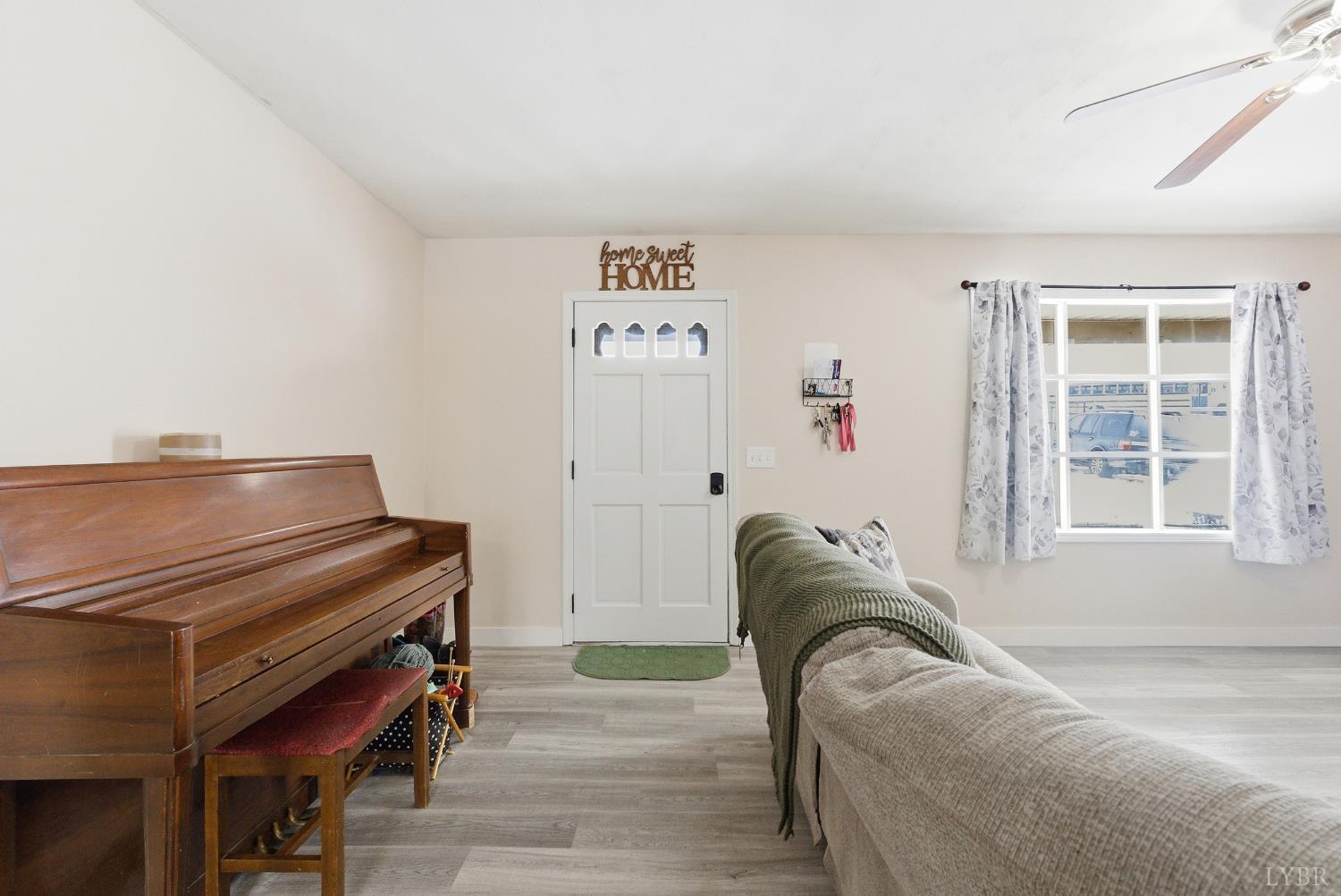 5225 Blue Ridge Drive Gretna, VA 24557 - Photo 5 of 28 a bedroom with furniture and a window