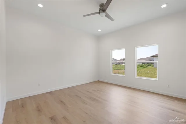 an empty room with windows