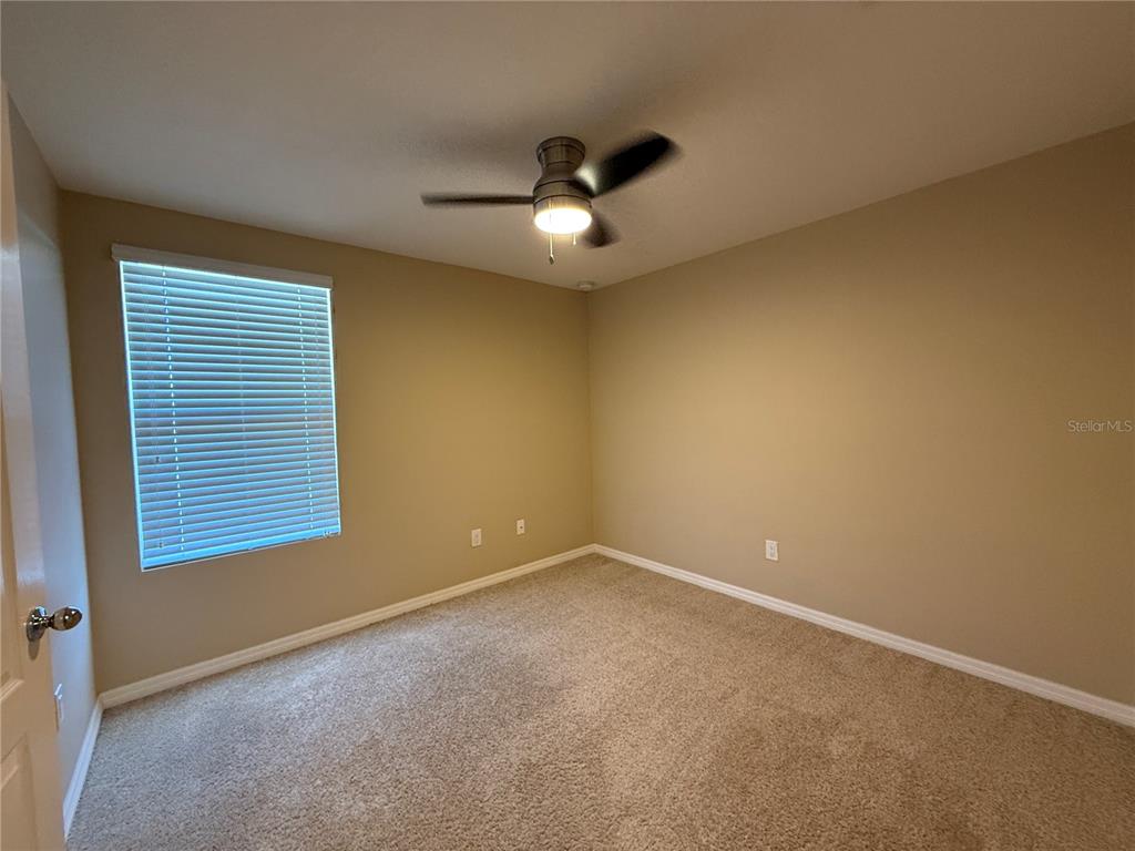 1623 Reflection Cove St. Cloud, FL 34771 - Photo 25 of 33 an empty room with a window