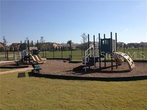 1623 Reflection Cove St. Cloud, FL 34771 - Photo 33 of 33 a park view with a bench