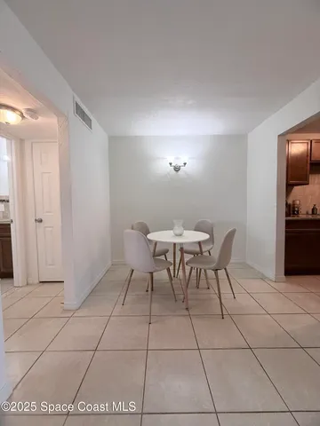 a kitchen with a stove and a microwave