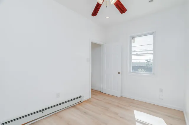 an empty room with closet