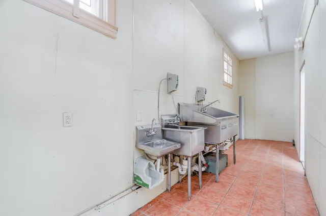 a bathroom with a toilet and a sink
