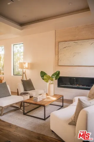 a living room with couch and a window