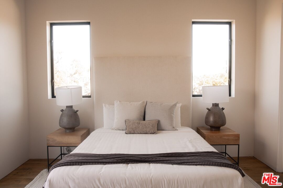 6546 Colgate Avenue Los Angeles, CA 90048 - Photo 31 of 42 a bedroom with a bed and window