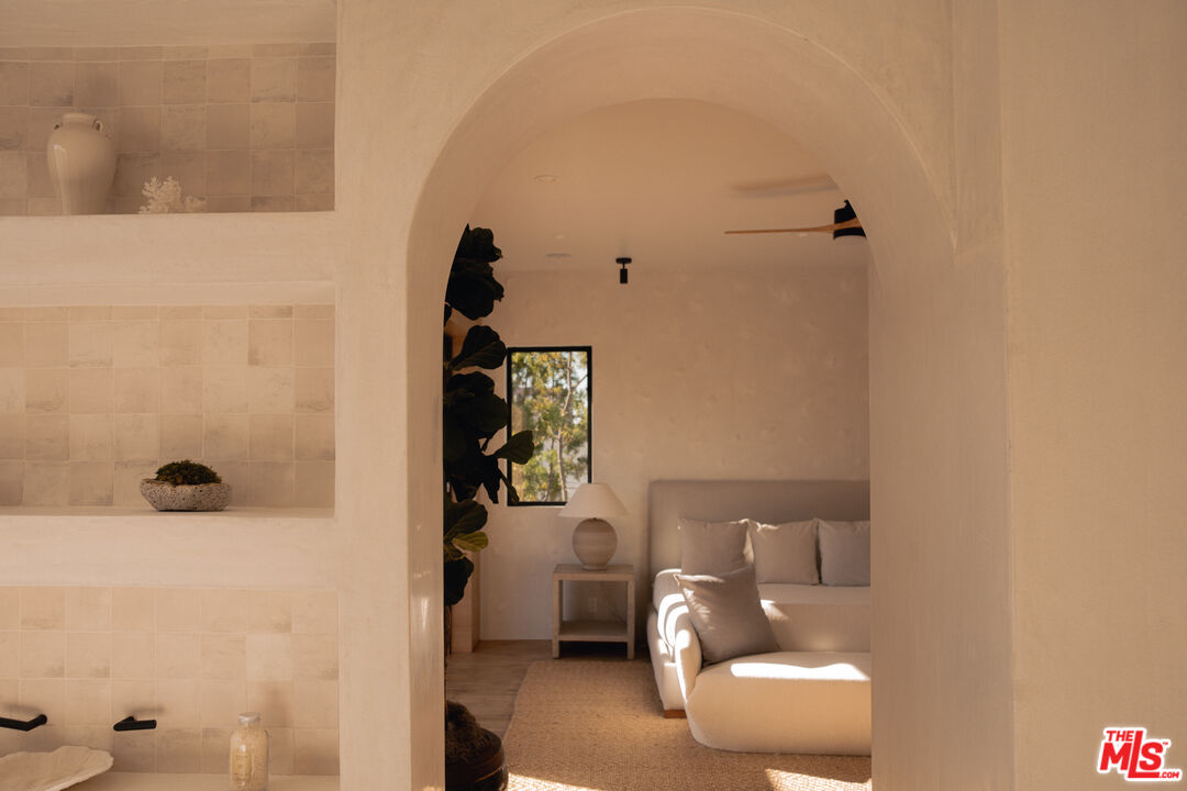 6546 Colgate Avenue Los Angeles, CA 90048 - Photo 38 of 42 a bathroom with a sink and a mirror