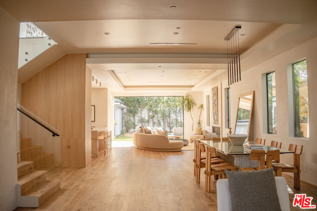 6546 Colgate Avenue Los Angeles, CA 90048 - Photo 5 of 42 a living room with furniture and a large window