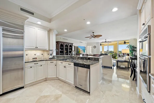 a kitchen with counter space cabinets and appliances