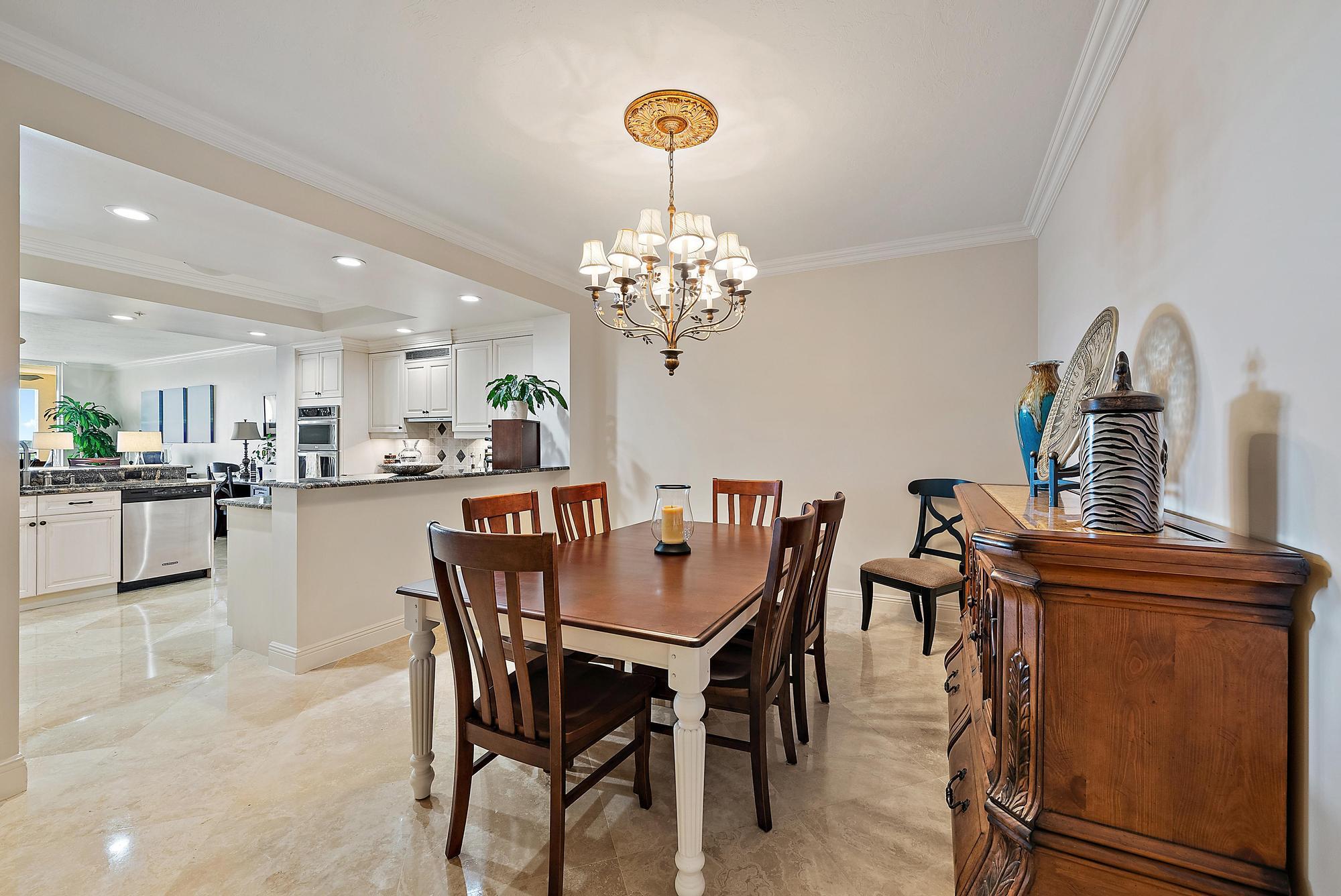 500 Highway 1, Unit 402 Jupiter, FL 33477 - Photo 18 of 37 a dining room with furniture and window