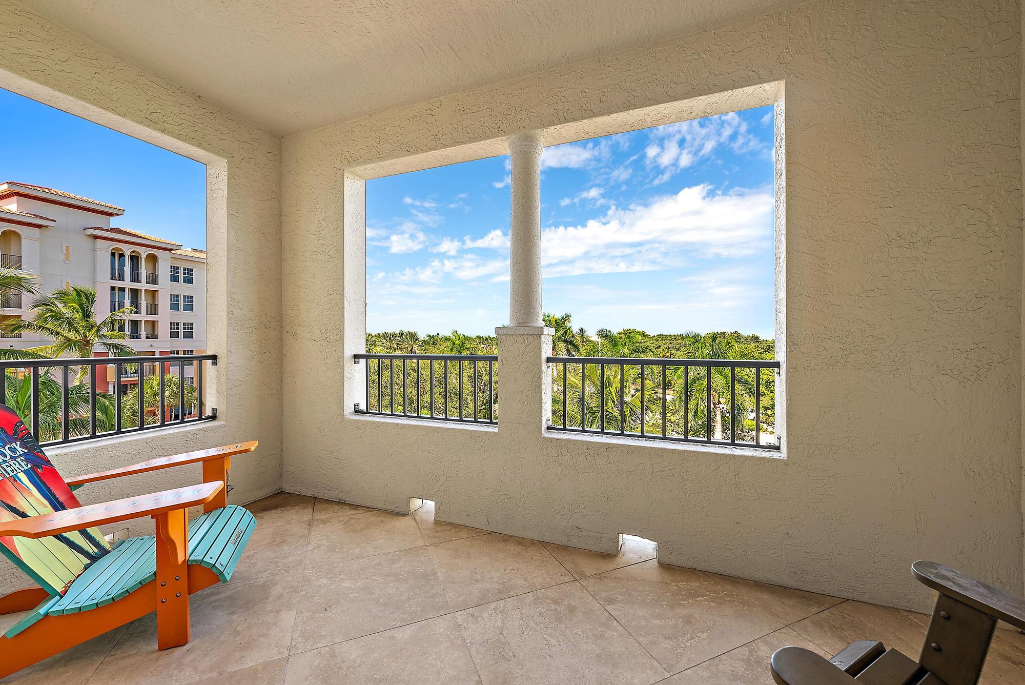 500 Highway 1, Unit 402 Jupiter, FL 33477 - Photo 21 of 37 a living room with furniture and a window