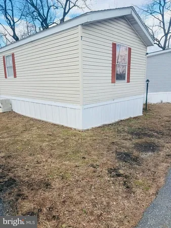 a view of a backyard of the house