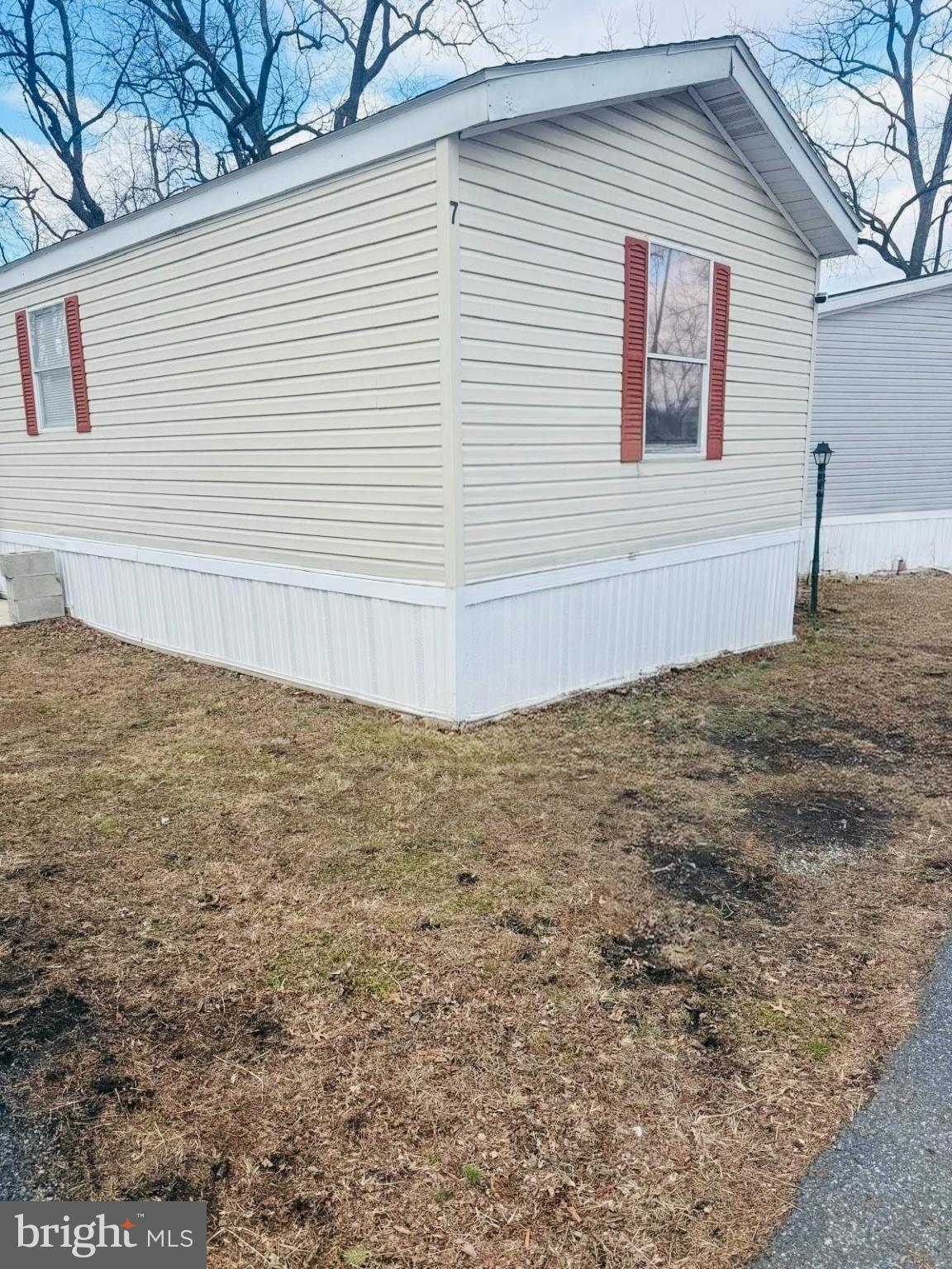 a view of a backyard of the house